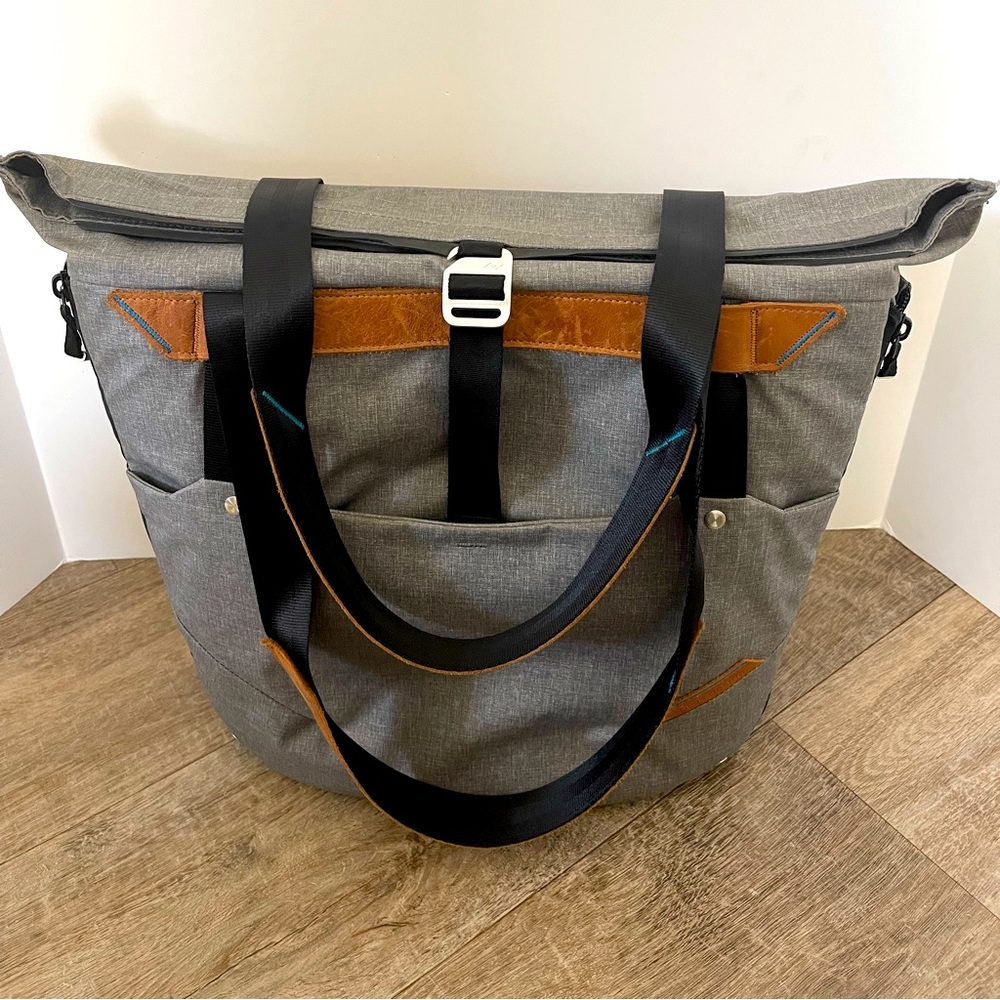 A perfect travel or work bag. Fits camera gear, laptops, adjustable sections